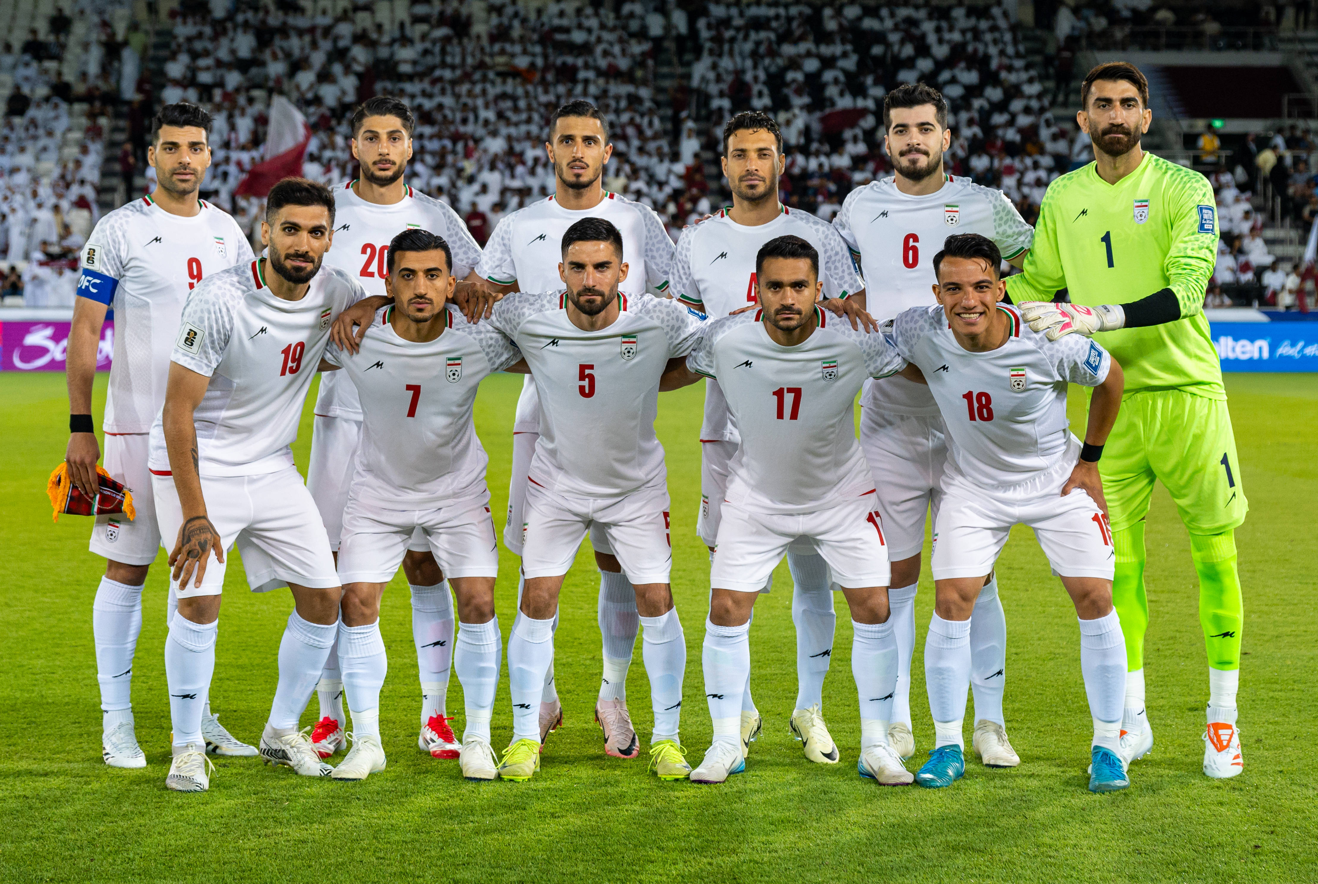 Iran players pose for a team photo