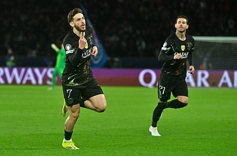 Khvicha Kvaratskhelia celebrates his goal against Chelsea