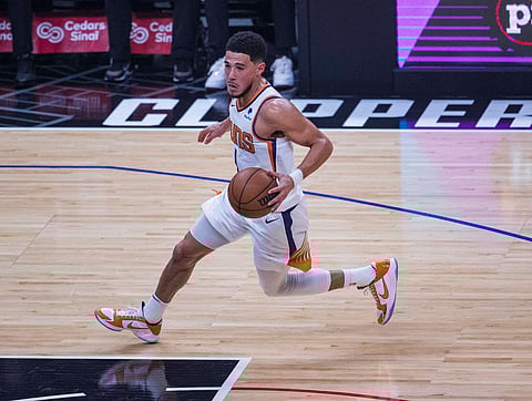 Devin Booker of Phoenix Suns in action