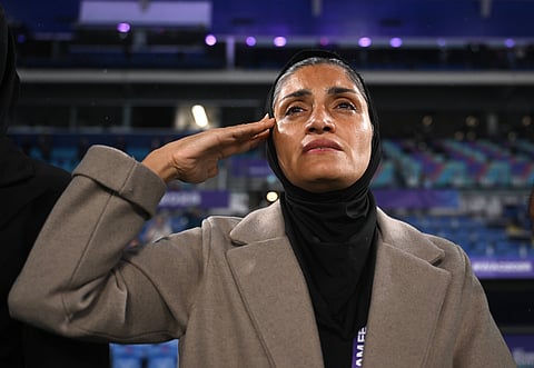 Marziyeh Jafari salutes during the national anthem during Asian Women's Cup