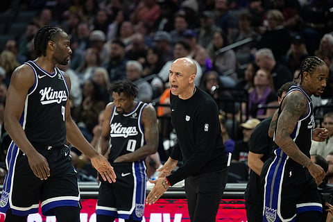 Precious Achiuwa with head coach Doug Christie