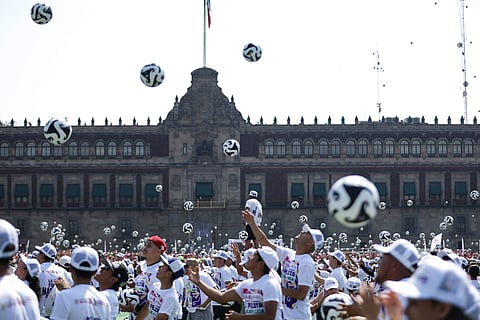 People take part in the largest football lesson in the world in Mexico City