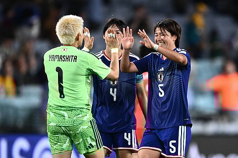 Japan celebrates after reaching the Asian Cup final