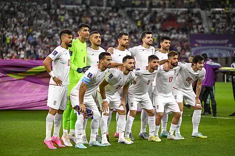 Iran players pose for a team photo