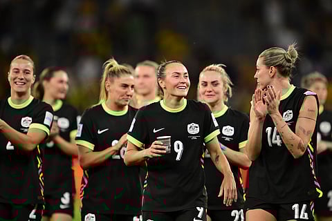 Team Australia celebrate after advancing to the Asian Cup final