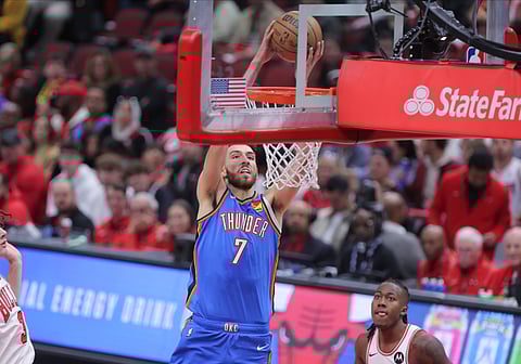 Chet Holmgren goes for a slam dunk