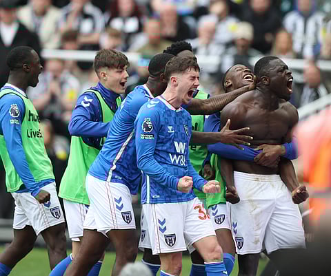 Brian Brobbey celebrates his winning goal with teammates