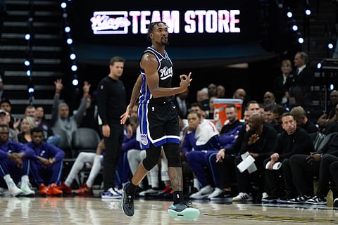 Malik Monk celebrates a three-point basket