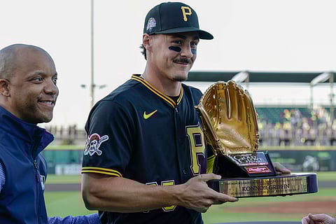 Konnor Griffin poses with 2025 Minor League Baseball Rawlings Golden Glove Award