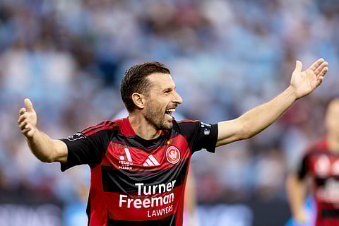 Kosta Barbarouses celebrates a goal against Sydney FC in A-League