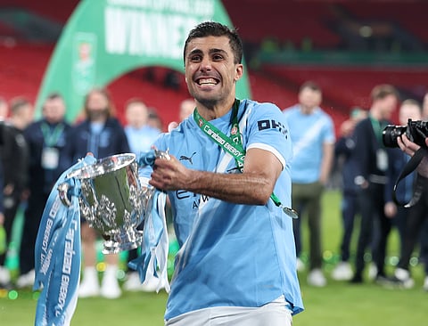 Rodri hold aloft the Carabao Cup