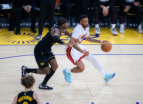 Norman Powell of Miami Heat drives forward with the ball