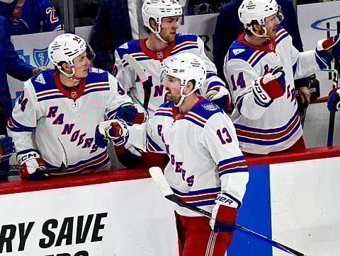New York Rangers players celebrate a goal
