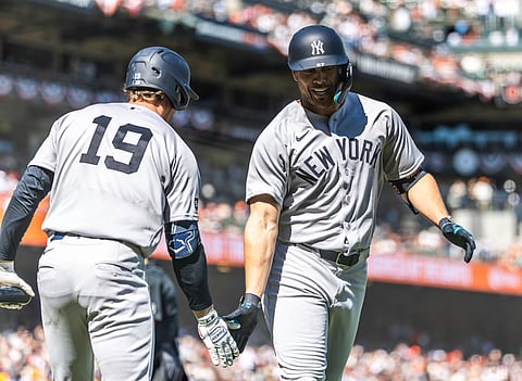 New York Yankees players in action against San Francisco Giants