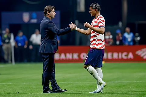 Mauricio Pochettino talks with Malik Tillman during friendly against Belgium