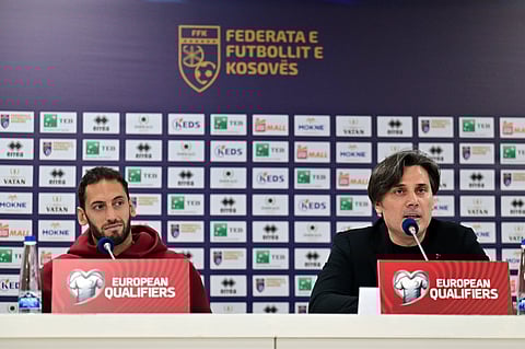 Vincenzo Montella and Hakan Calhanoglu atttend the pre-match press conference