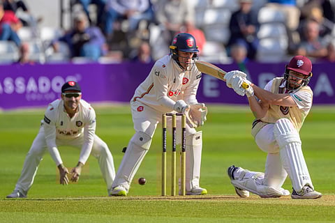 Essex and Surrey players in action during the Rothesay County Championship
