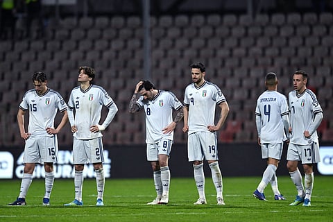 Italy footballers look dejected after missing out on World Cup for a third consecutive time
