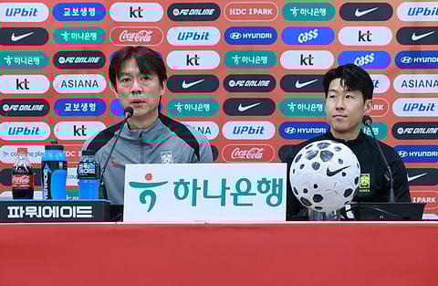 South Korea coach Hong Myung-bo with captain Heung Min-Son