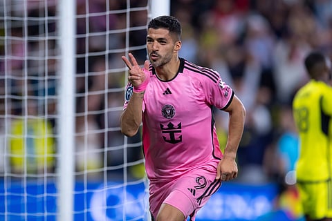 Luis Suarez celebrates his goal