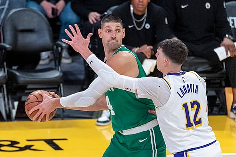 Nikola Vucevic with the ball