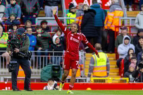 Rio Ngumoha celebrates after scoring the first goal for Liverpool