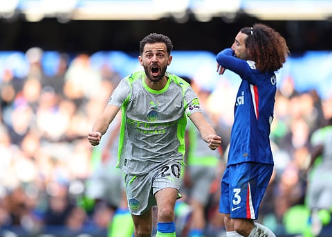 Bernardo Silva celebrates after Marc Guehi scored the second goal for Manchester City