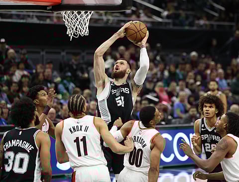 Portland Trail Blazers and San Antonio Spurs players in action