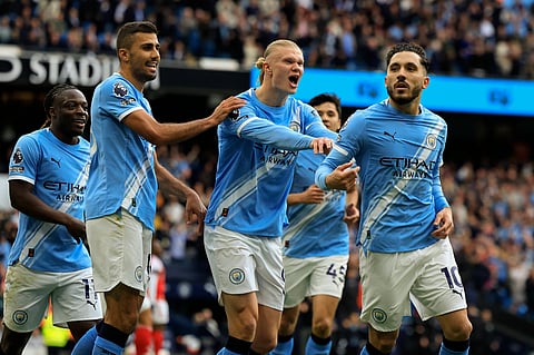 Erling Haaland celebrates after netting the winning goal against Arsenal