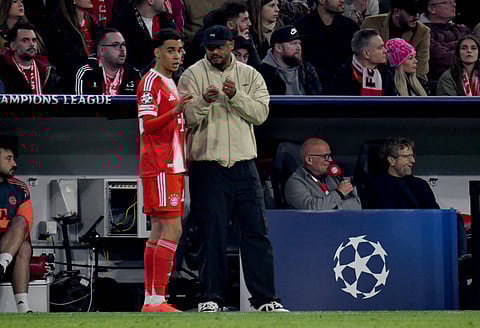 Vincent Kompany with Jamal Musiala