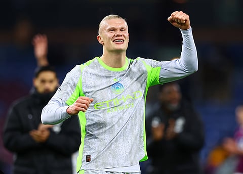 Erling Haaland celebrates at full-time