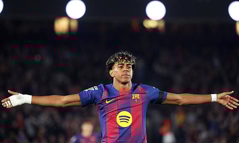 Lamine Yamal celebrates after scoring for FC Barcelona