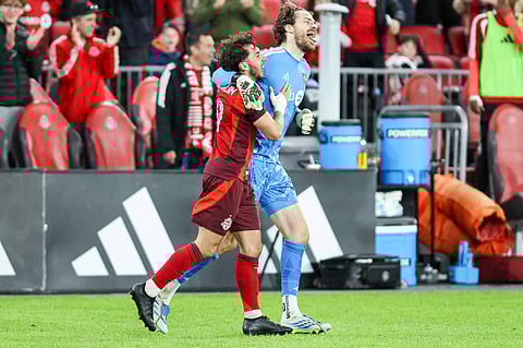 Goalkeeper Luka Gravan celebrates after scoring the equaliser for Toronto FC