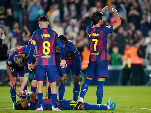 Lamine Yamal goes down after suffering an injury against Celta Vigo