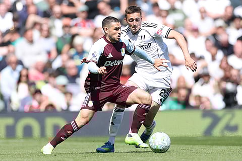 Aston Villa and Fulham players in action