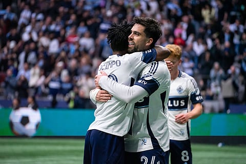 Brian White celebrates with Edier Ocampo