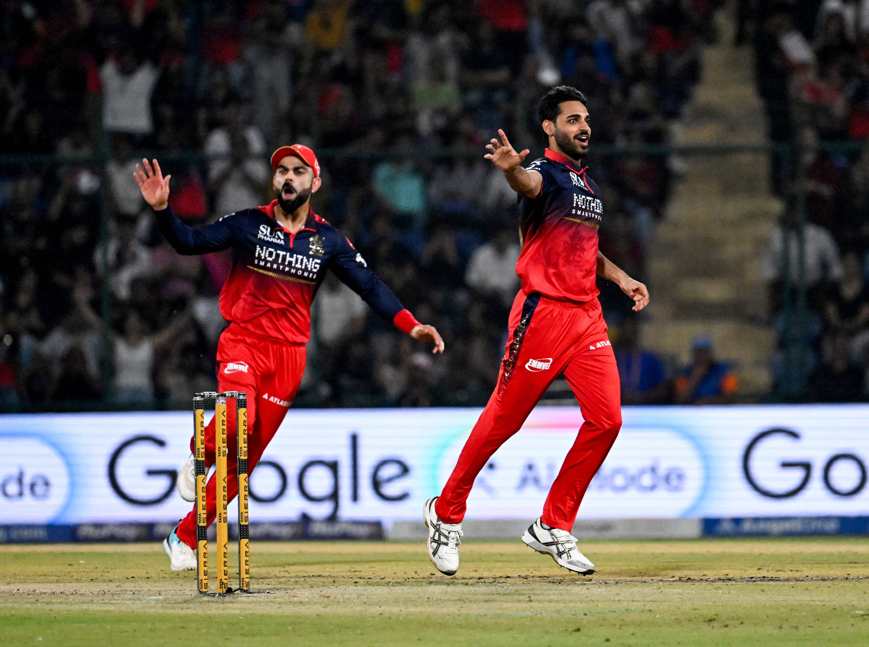 Bhuvneshwar Kumar celebrates after dismissing Tristan Stubbs