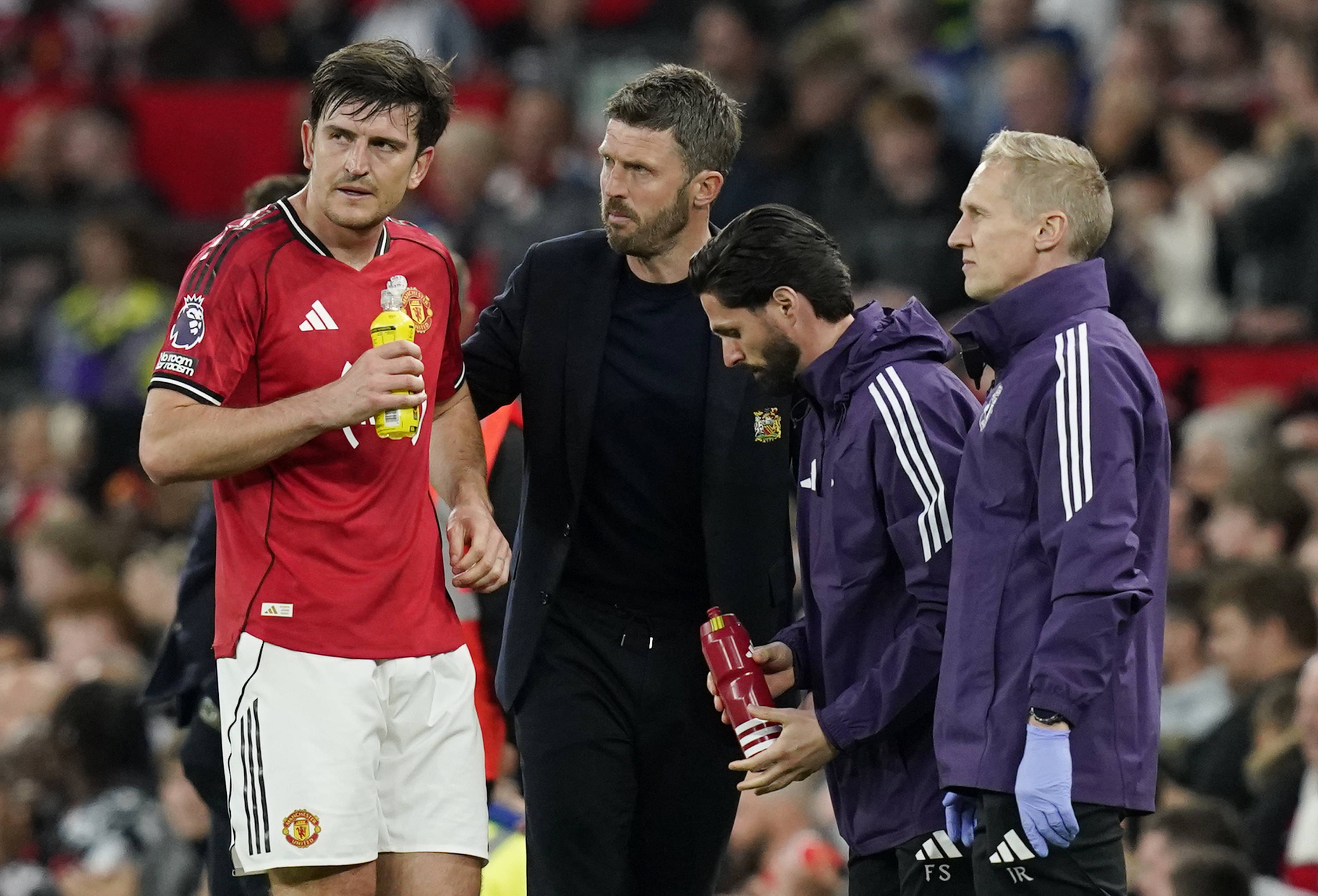 Harry Maguire with Michael Carrick