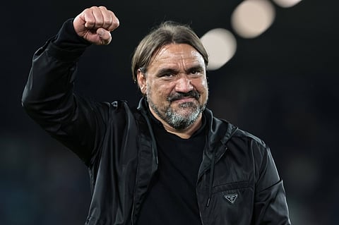 Daniel Farke celebrates with fans after win over Burnley
