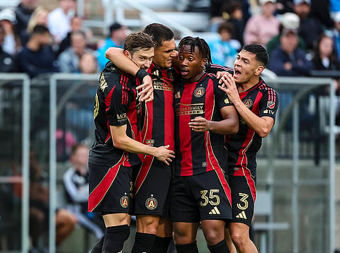 Atlanta United players celebrate a goal