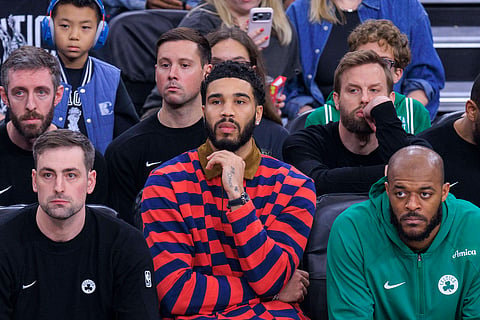 Jayson Tatum on the Boston Celtics bench