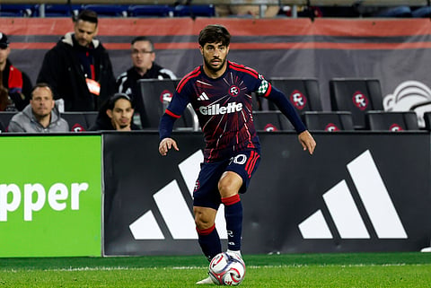 Carles Gil in action against Charlotte FC