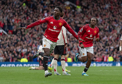 Kobbie Mainoo celebrates after scoring the winning goal