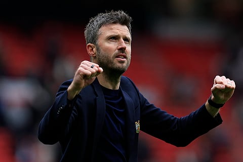 Michael Carrick celebrates at full-time at Old Trafford