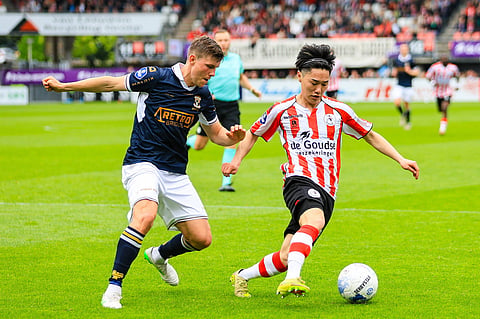 Sparta and Go Ahead Eagles players in action during an Eredivisie match
