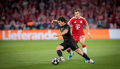 Joao Neves in action against Bayern Munich