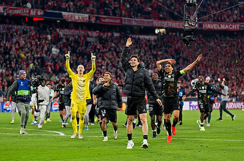 Paris St Germain players celebrate at full time