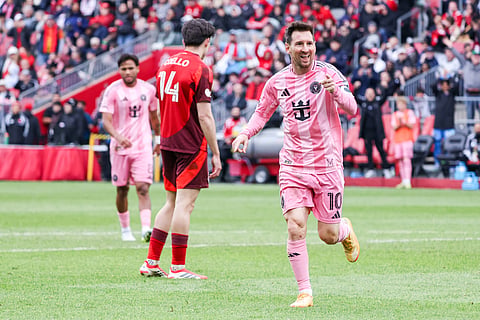 Lionel Messi celebrates his goal against Toronto FC