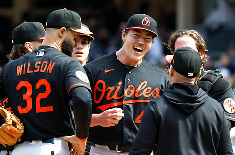 Baltimore Orioles players celebrate against New York Yankees