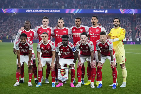 Arsenal team line up for a photo